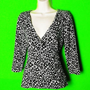 Michael Kors animal print wrap blouse.